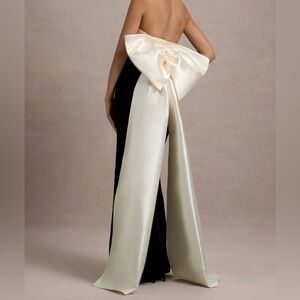 Elegant Black and Cream Strapless Dress with Bow Detail